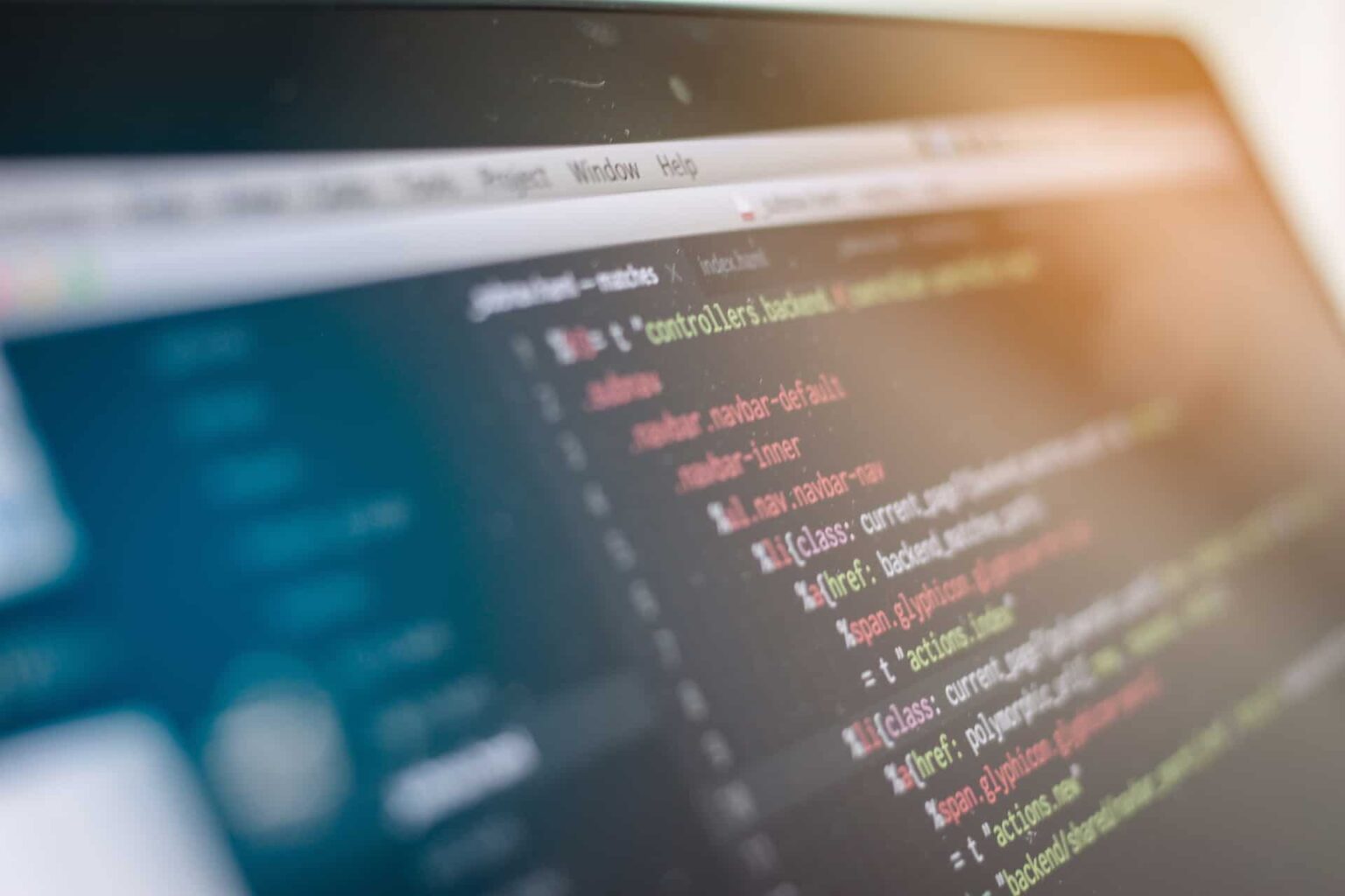 Close-up of computer screen displaying programming code