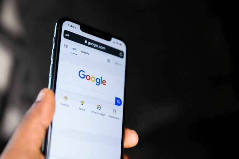 Smartphone displaying Google homepage search screen