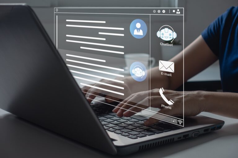Person using laptop with online customer support interface
