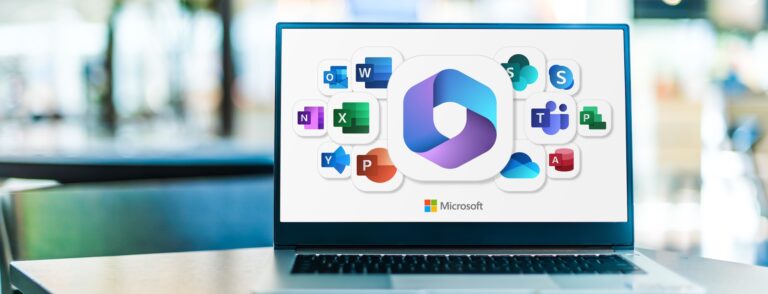 Laptop displaying Microsoft 365 apps on screen