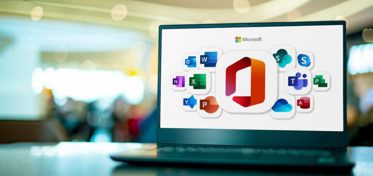 Laptop displaying Microsoft Office app icons