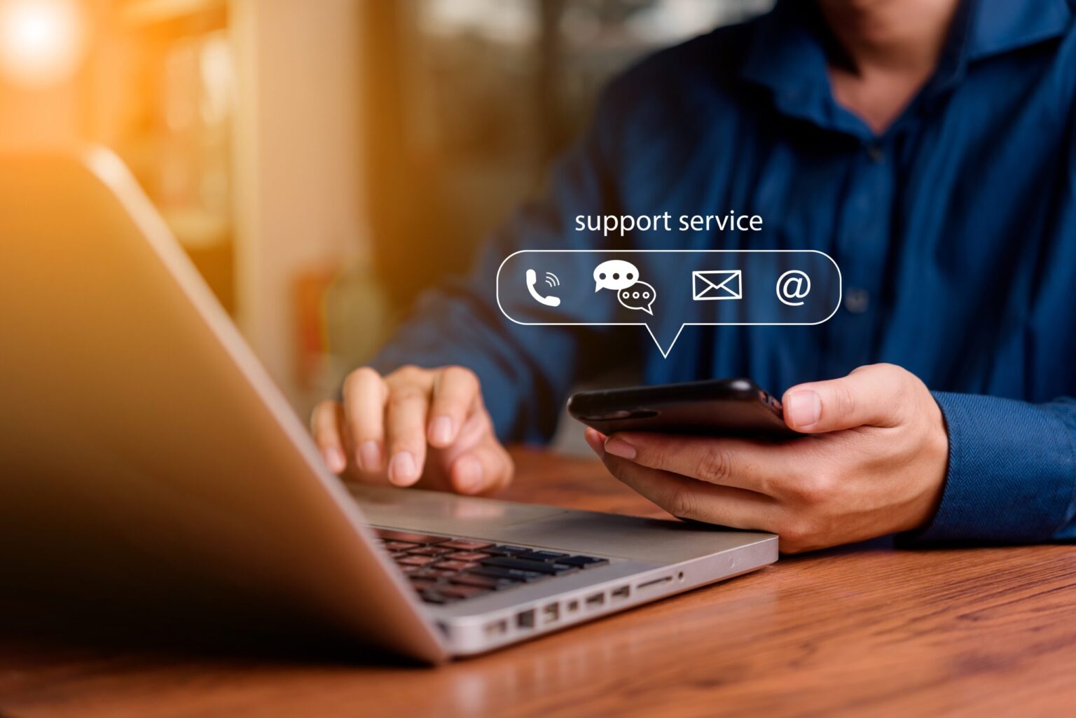 Customer support service icons over smartphone and laptop