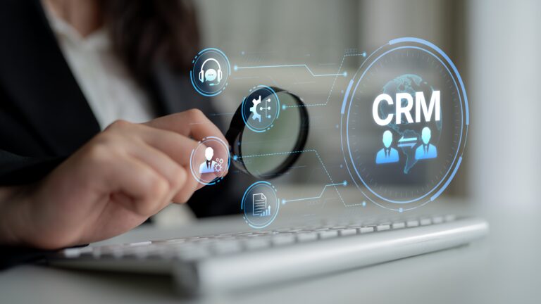 Business professional analysing CRM data interface