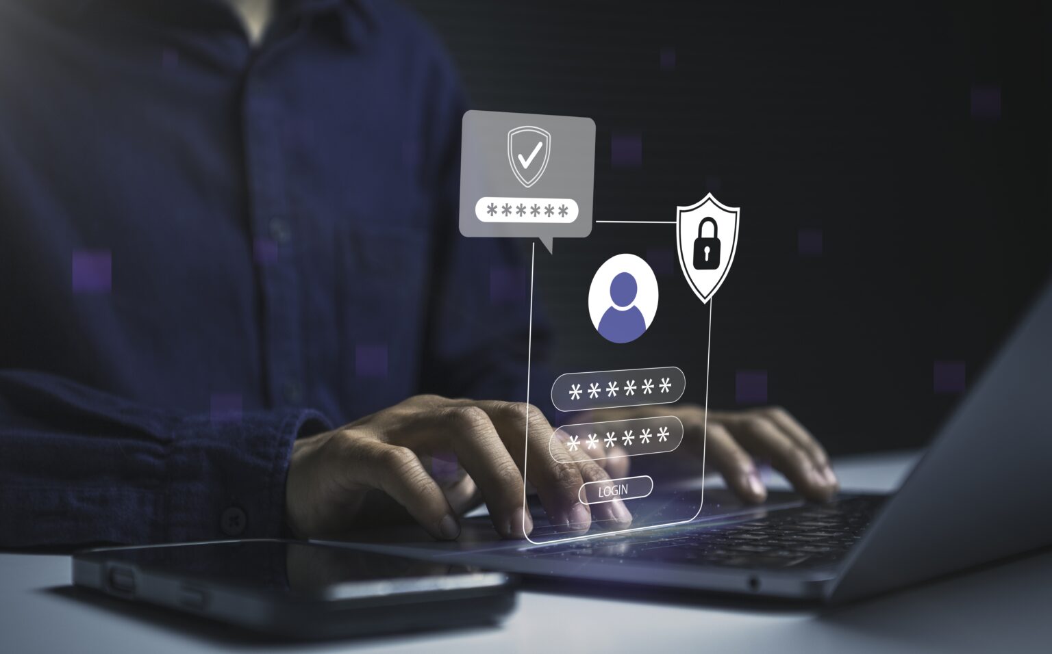 User logging into secure online account on laptop