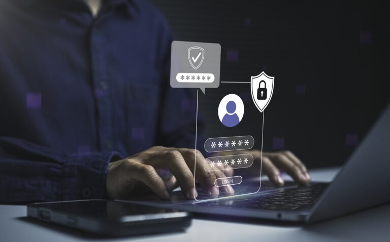 User logging into secure online account on laptop